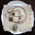 Brass-Inlaid Blue Glass Pendant Necklace – The Time-Capsule