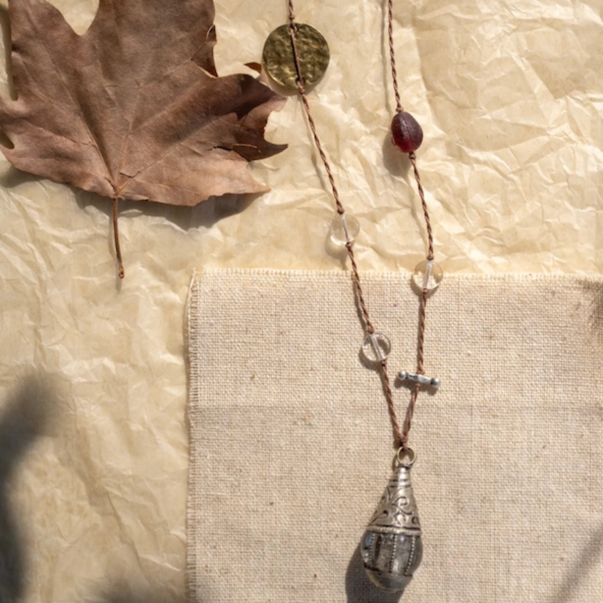 Brass-Inlaid Blue Glass Pendant Necklace – The Time-Capsule